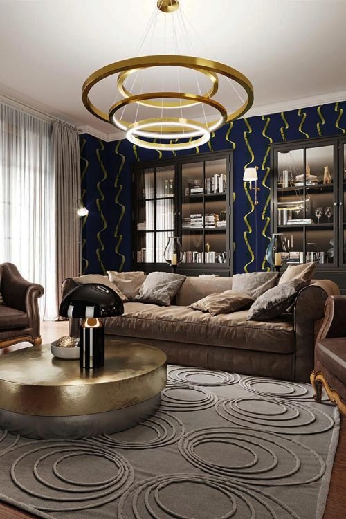 A modern eclectic living room in dark colors, with a soft leather sofa and an armchair. Black bookcase built-in wardrobe. 3D rendering